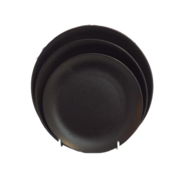 Stack of black round bowls nested inside each other, viewed from above.
